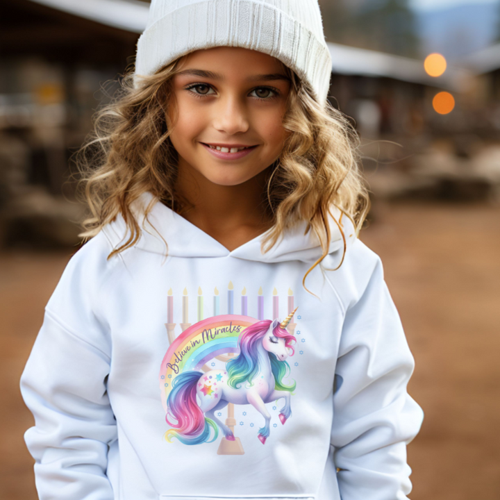 Believe in Miracles Rainbow Unicorn Hanukkah Youth Heavy Blend Hoodie Salt and Sparkle